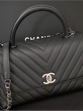 CHANEL Black Chevron Quilted Top-Handle Satchel with Silver Hardware